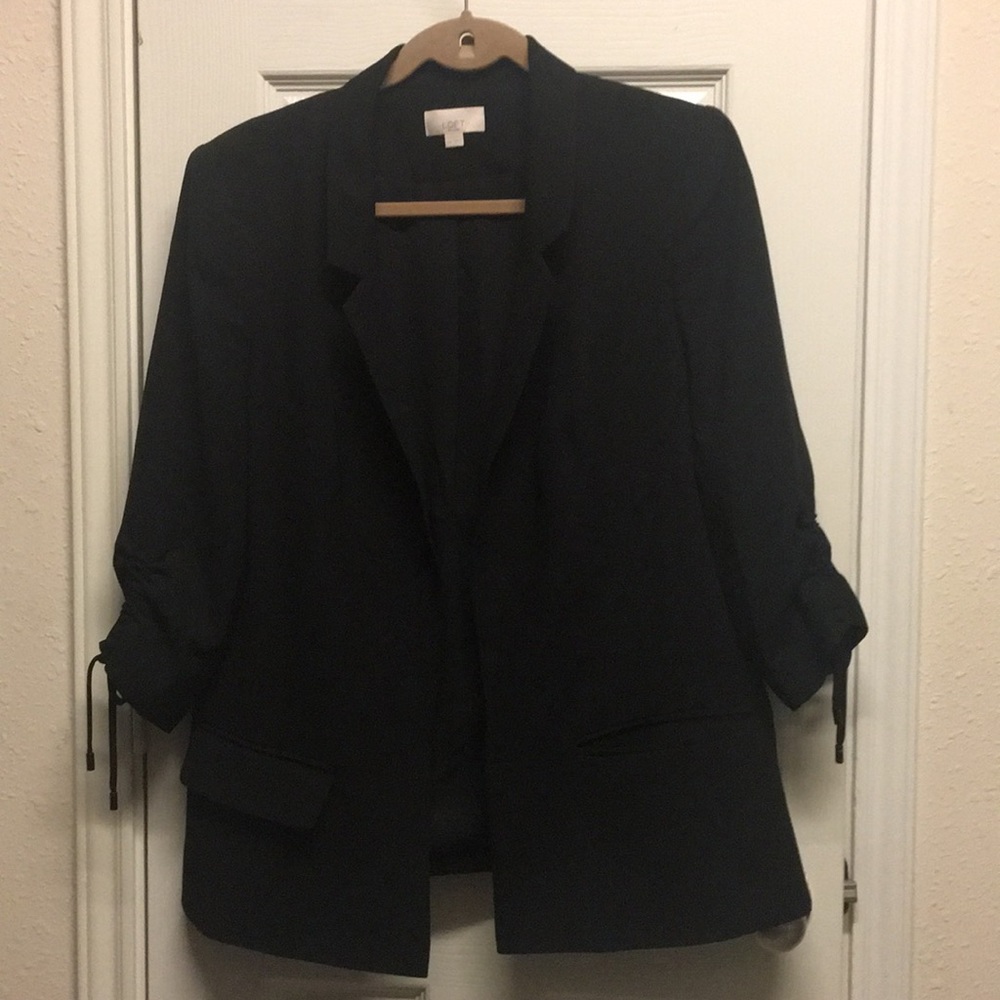 Black coat, new but tag removed already